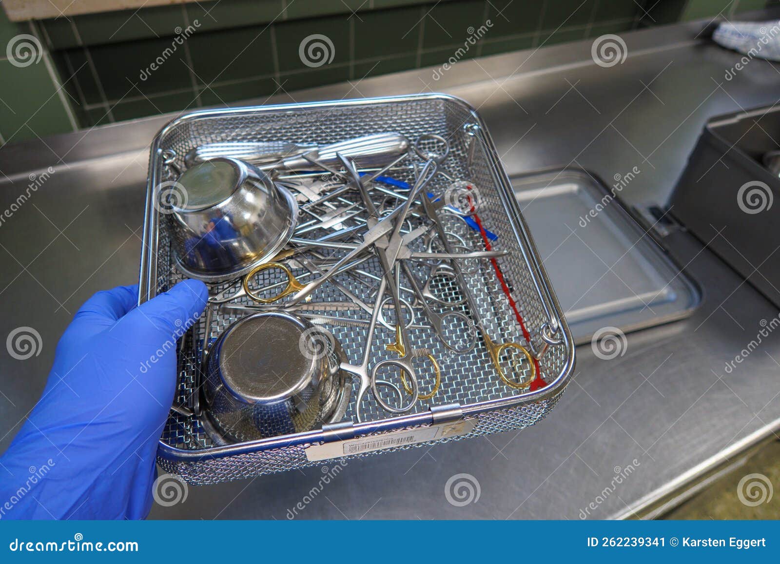 Various Surgical Instruments are Located in an Instrument Basket Stock