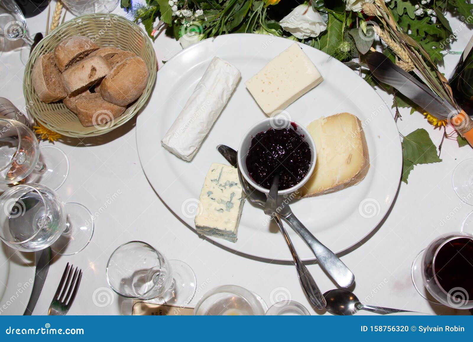 Various Types of Cheese Plate Served with Jam in Dinner Party Stock