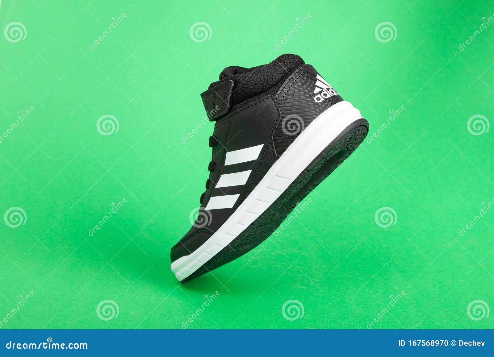 Varna , Bulgaria SEPETEMBER 27, 2019 ADIDAS Shoe, on Green Background. Product Editorial Image - Image of germany, sport: 167568970