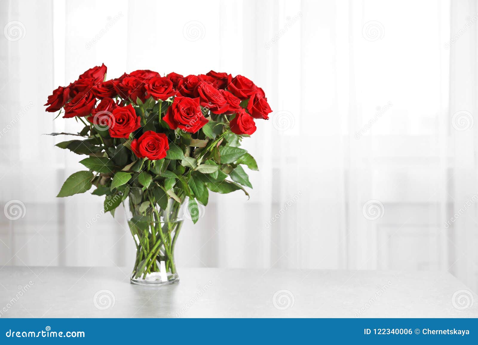 Vase with Beautiful Red Roses Stock Photo - Image of botanical, indoors ...