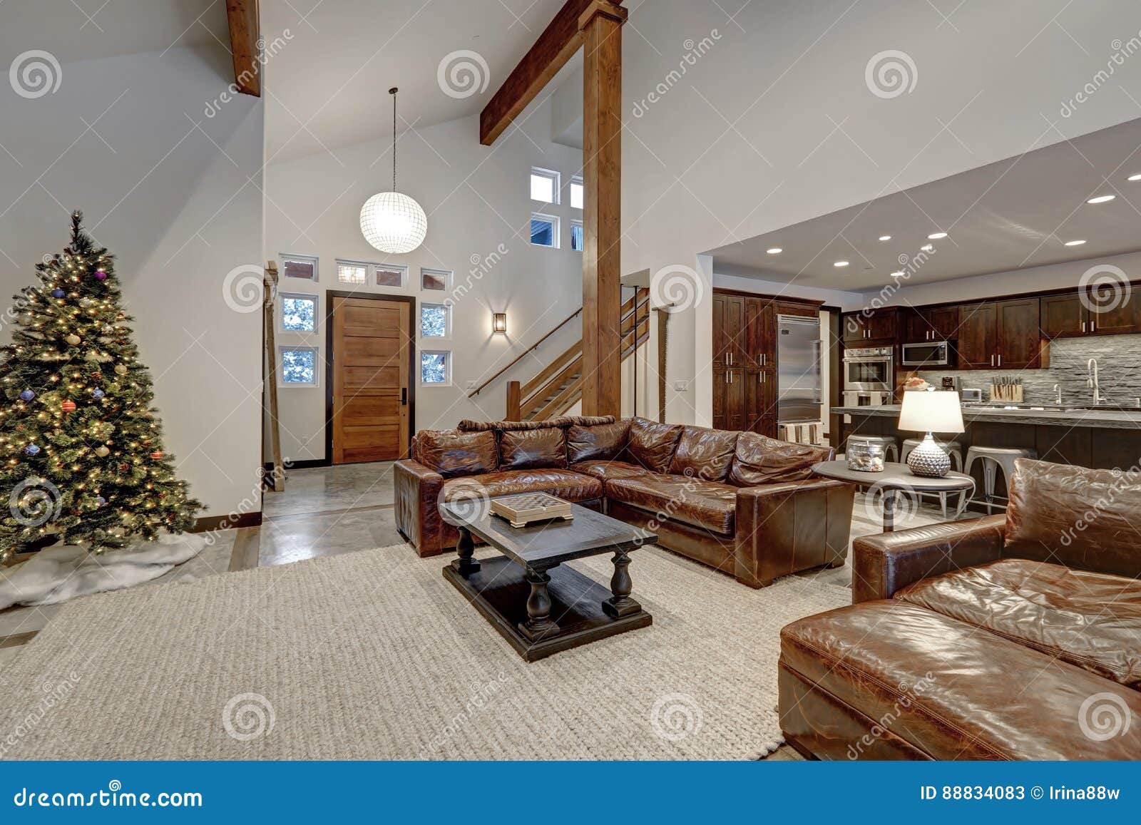 Vaulted Ceiling Living Room with Brown Leather Sofas Stock Image ...
