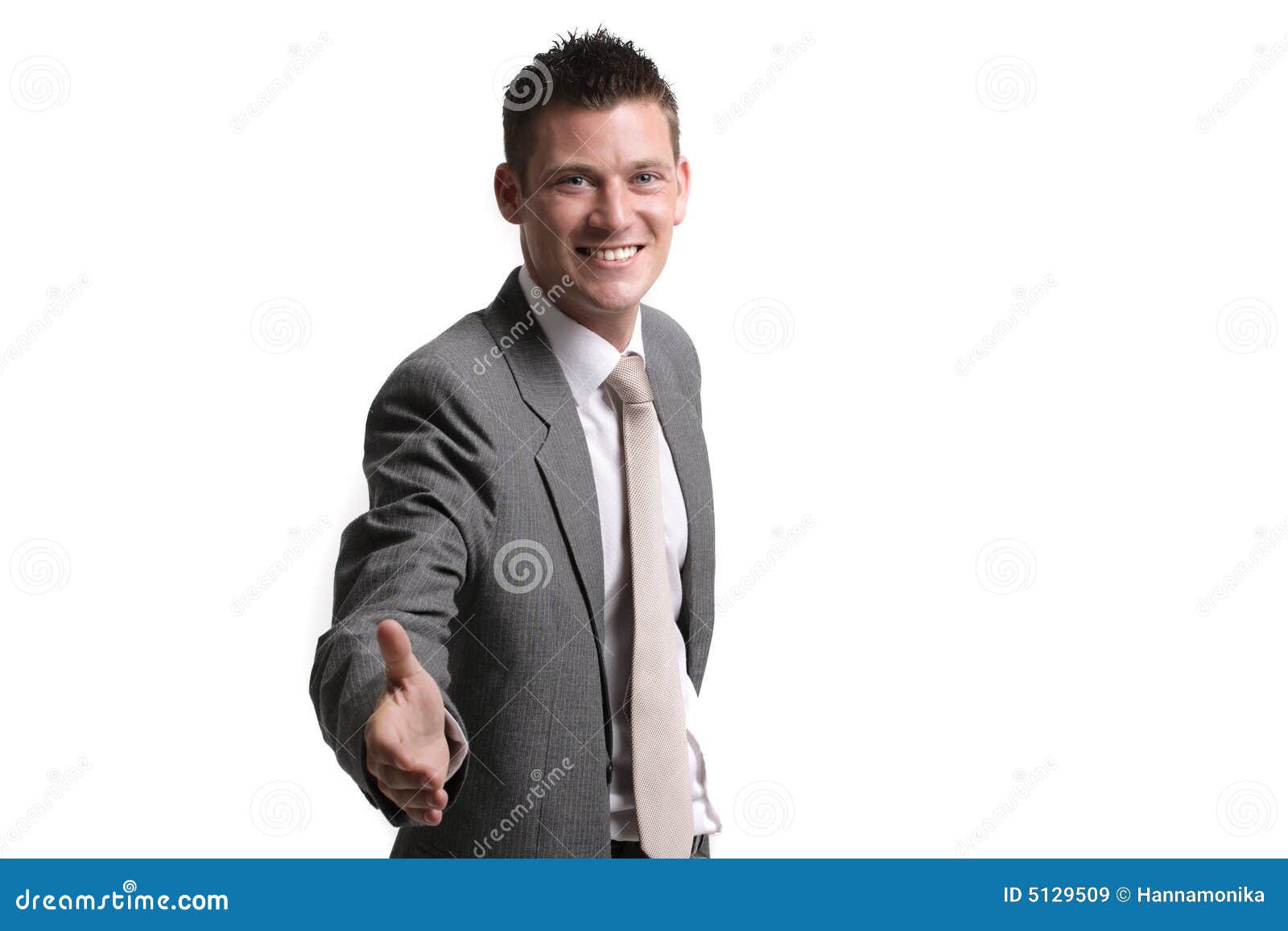 We ve got a deal!. Cheerful young businessman with an open hand ready to seal a deal. isolated on white background, lots of copyspace.