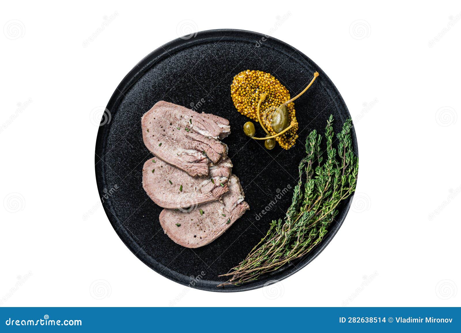 Veal or Beef Boiled Tongue Slices on a Plate. High Quality Isolate