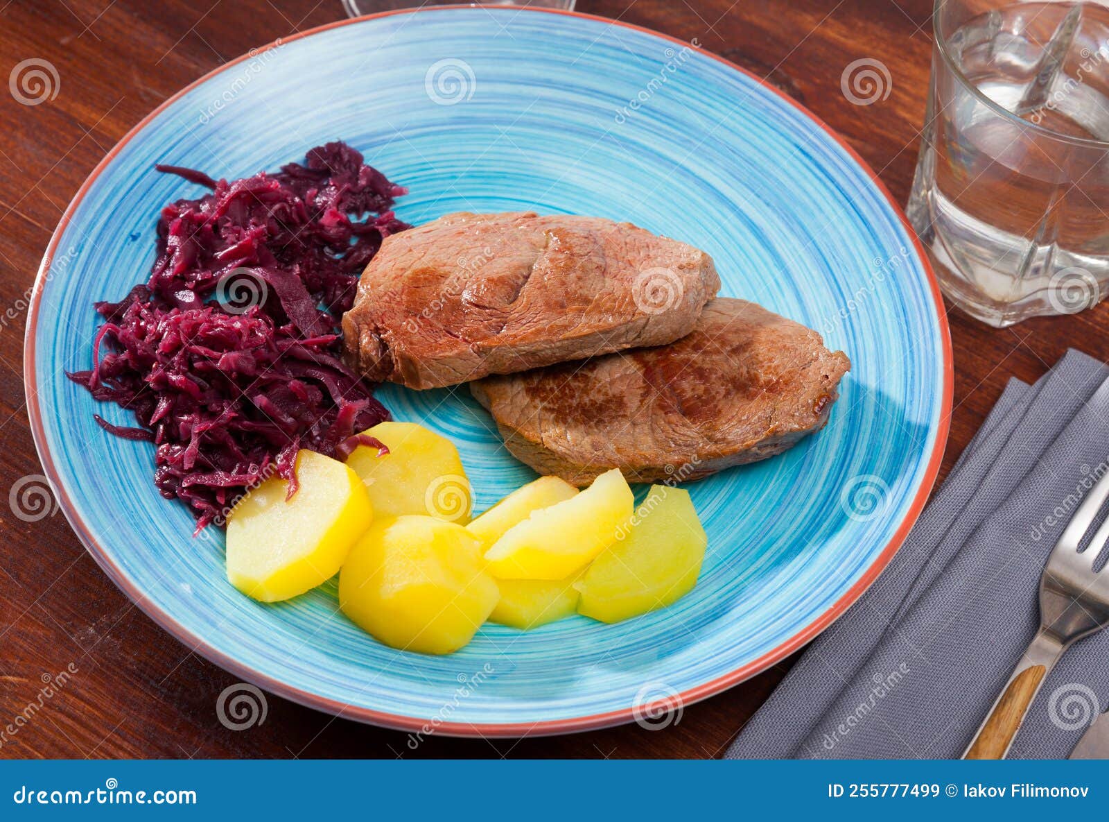 veal steak with potato and sauerkraut