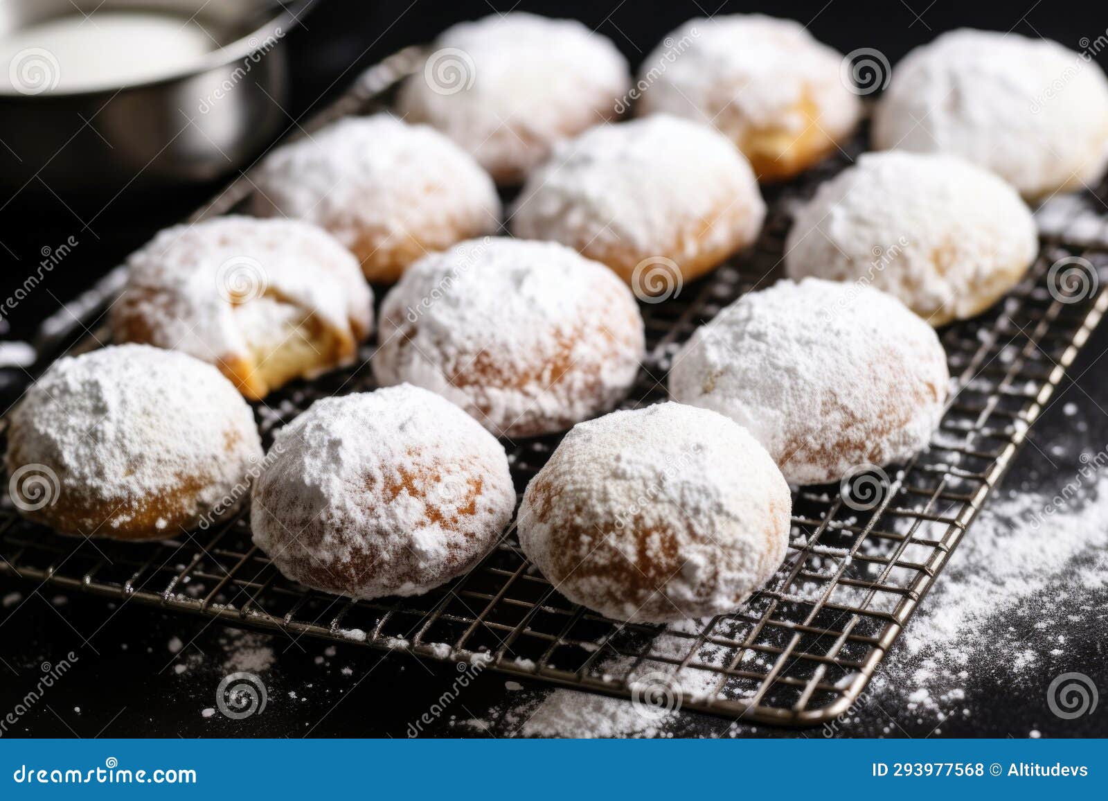Vegan Doughnuts Dusted with Powdered Sugar on a Wire Rack Stock