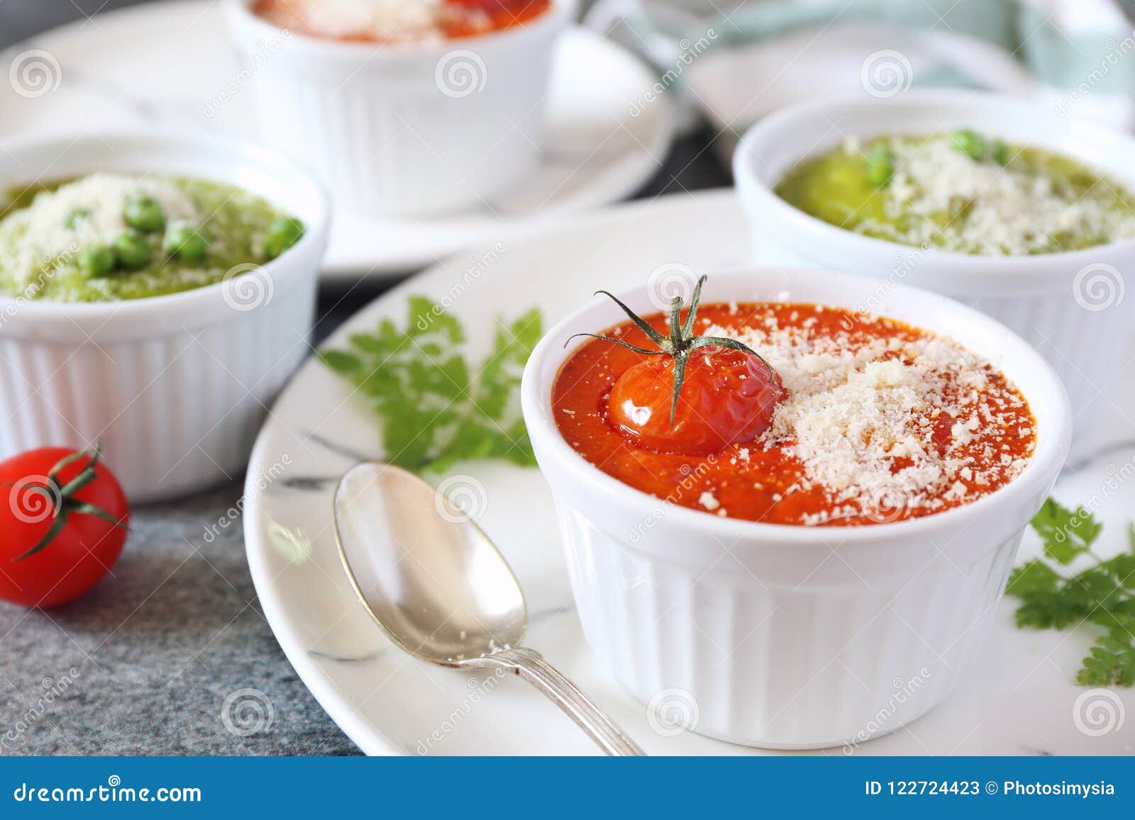 vegetable appetizer: tomato soufflÃÂµ and green pea flan. focus s