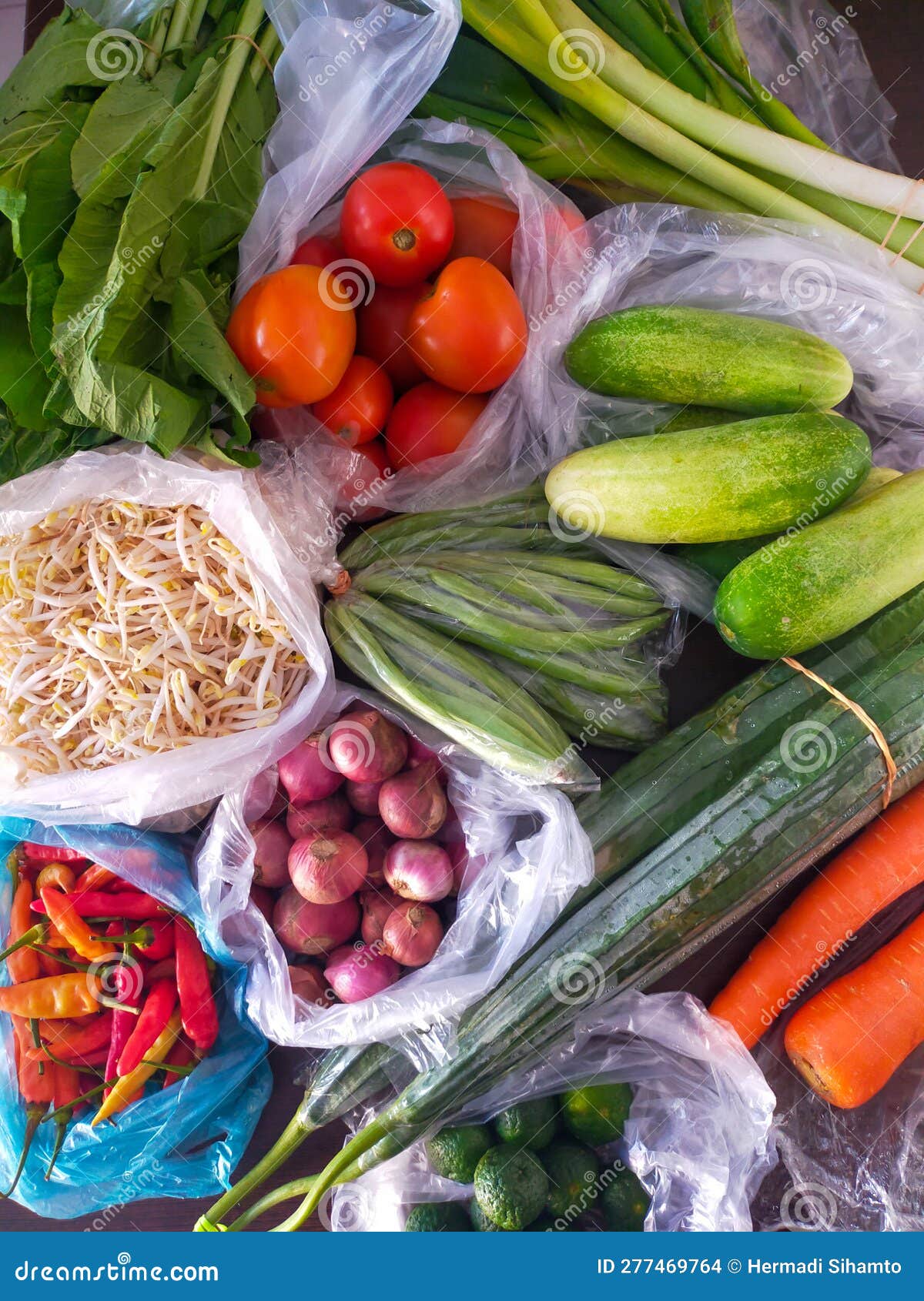 Vegetable Groceries in Plastic Bags on the Table Stock Photo Image of domestic, market 277469764