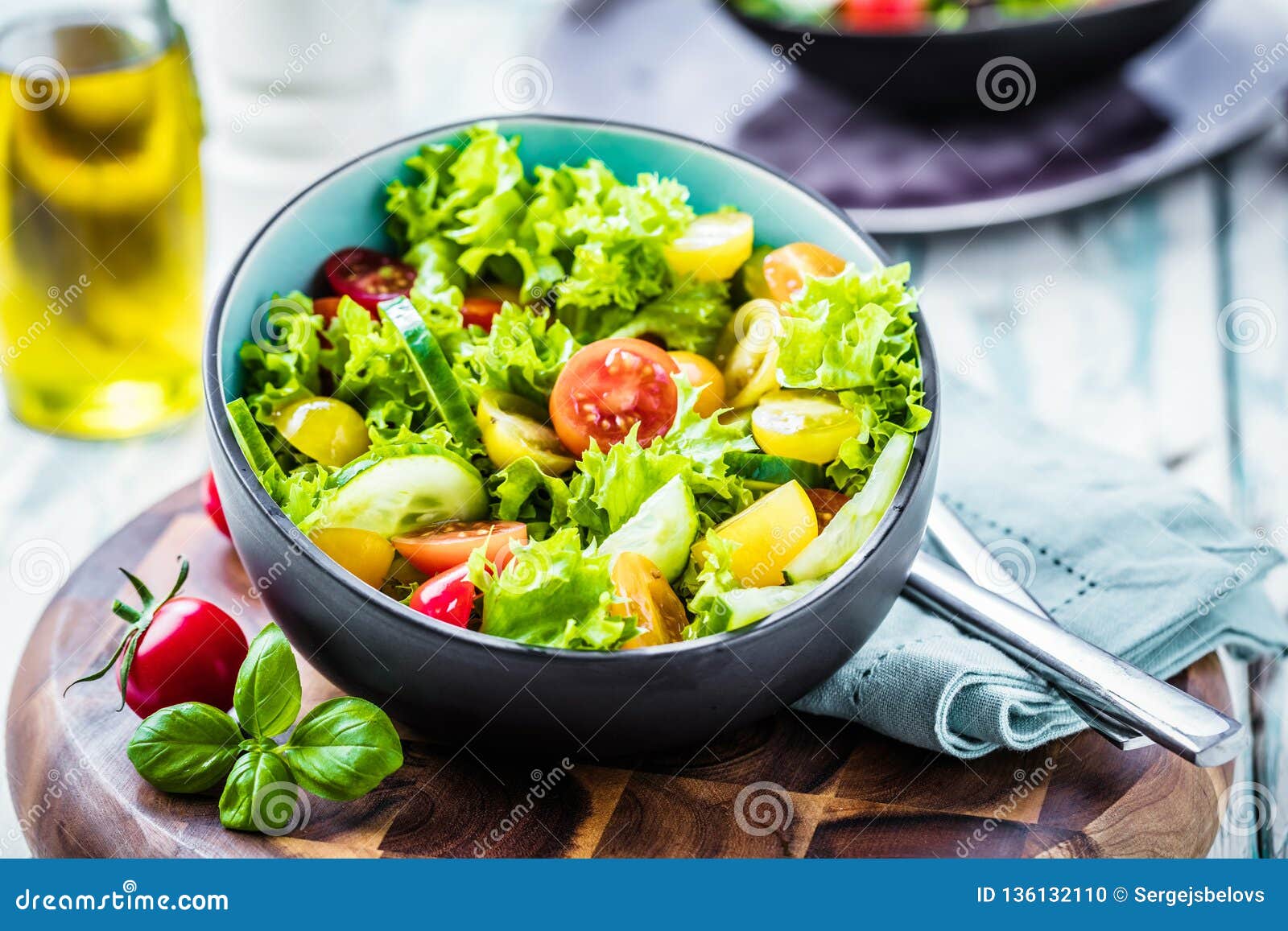 Vegetable Salad Bowl on Kitchen Table. Balanced Diet Stock Photo