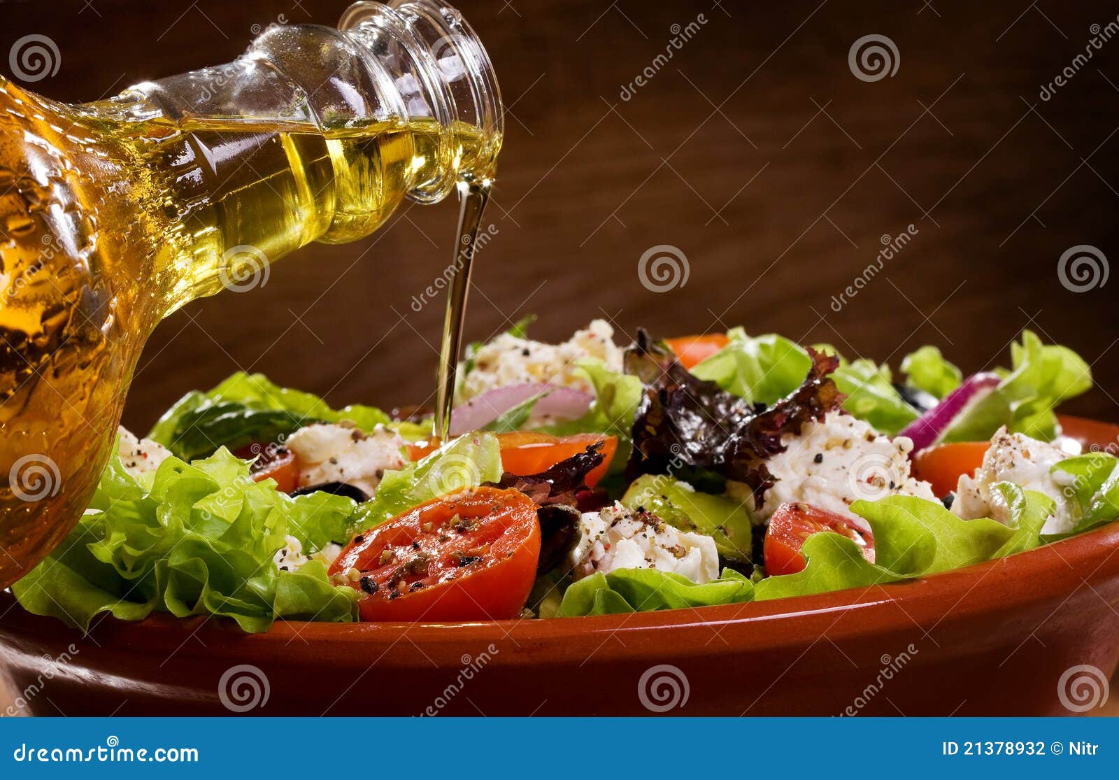 Vegetable Salad with Olive Oil Pouring from a Bott Stock Photo Image