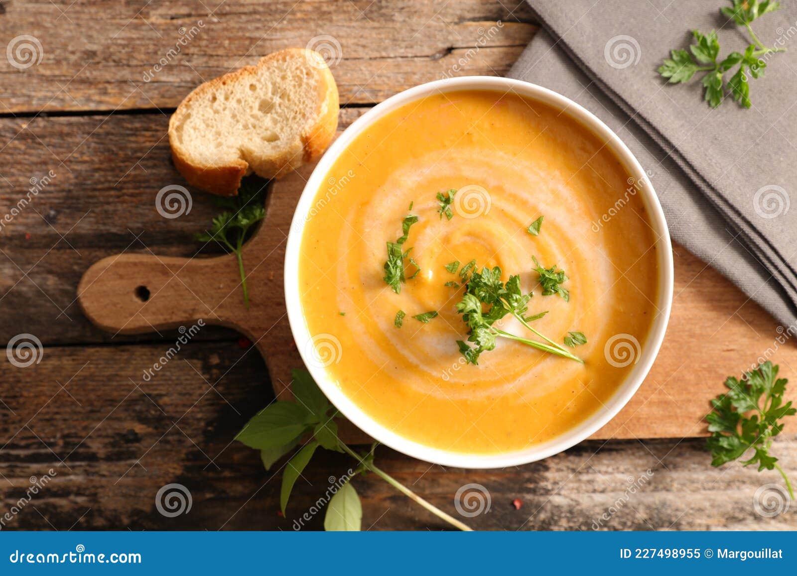 Vegetable soup and herbs stock image. Image of orange 227498955