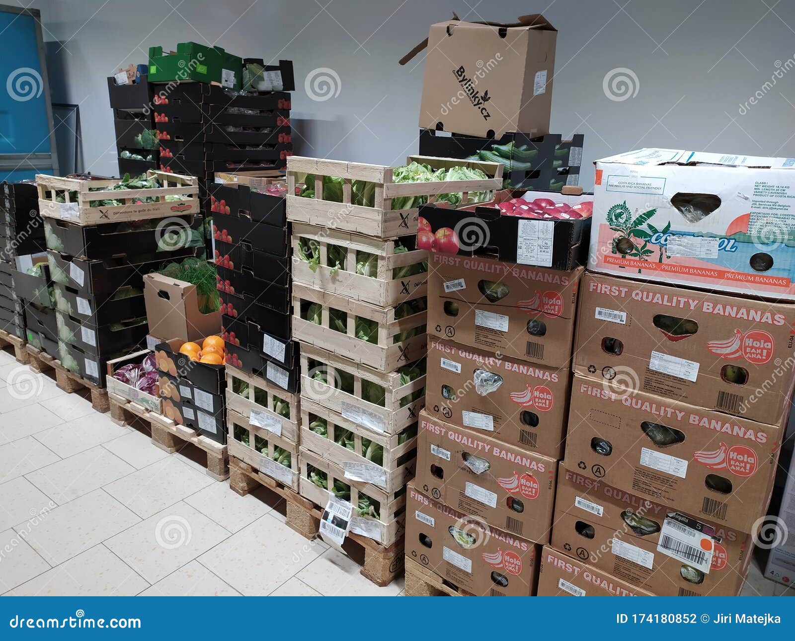 Vegetables and Fruits in Crates Ready in Store in Warehouse Editorial