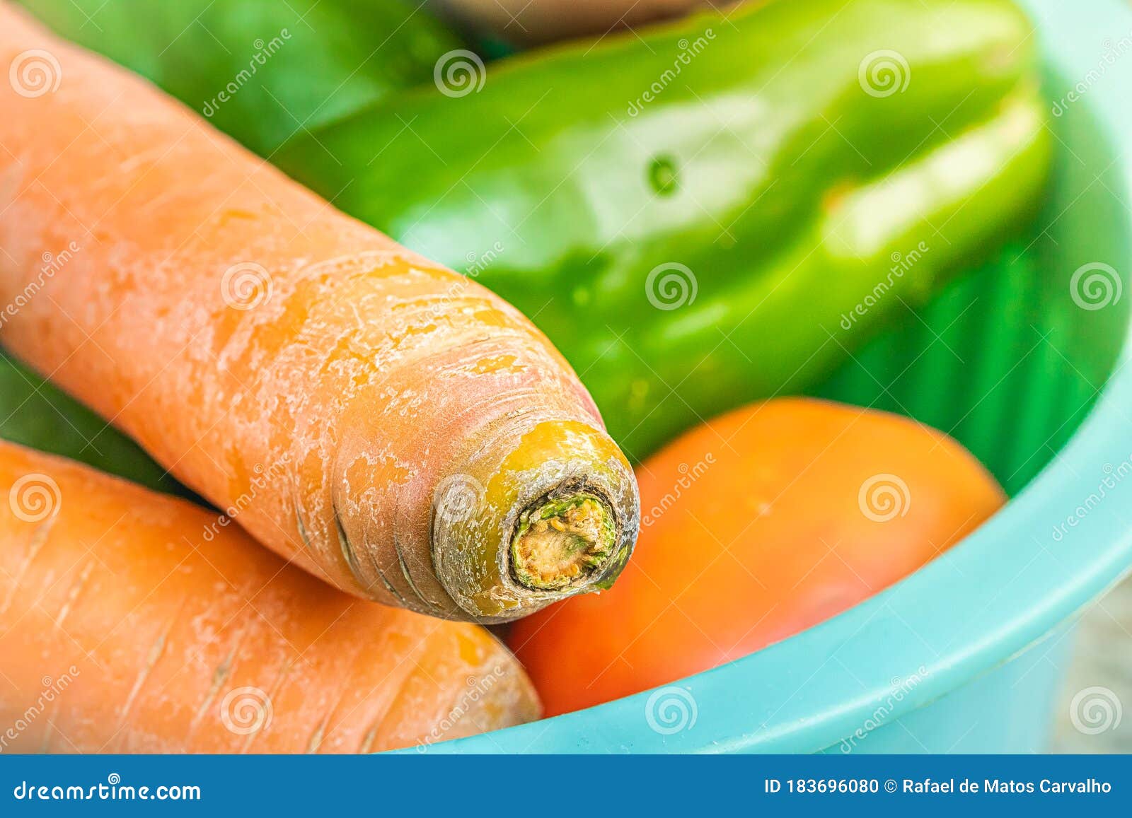 vegetables in green bowl. carrot, chayot, tomato, ingredients,  salad.