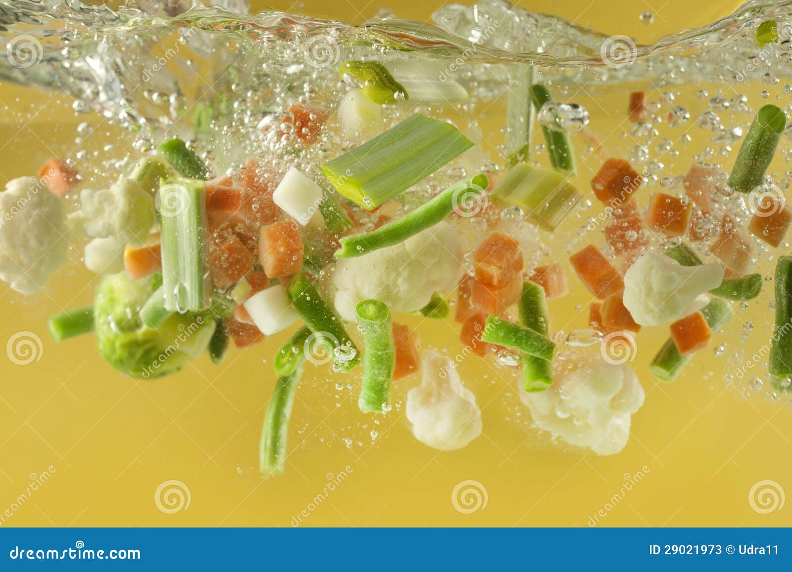 Vegetables Splash in Water Soup Cooking Concept Stock Image Image of