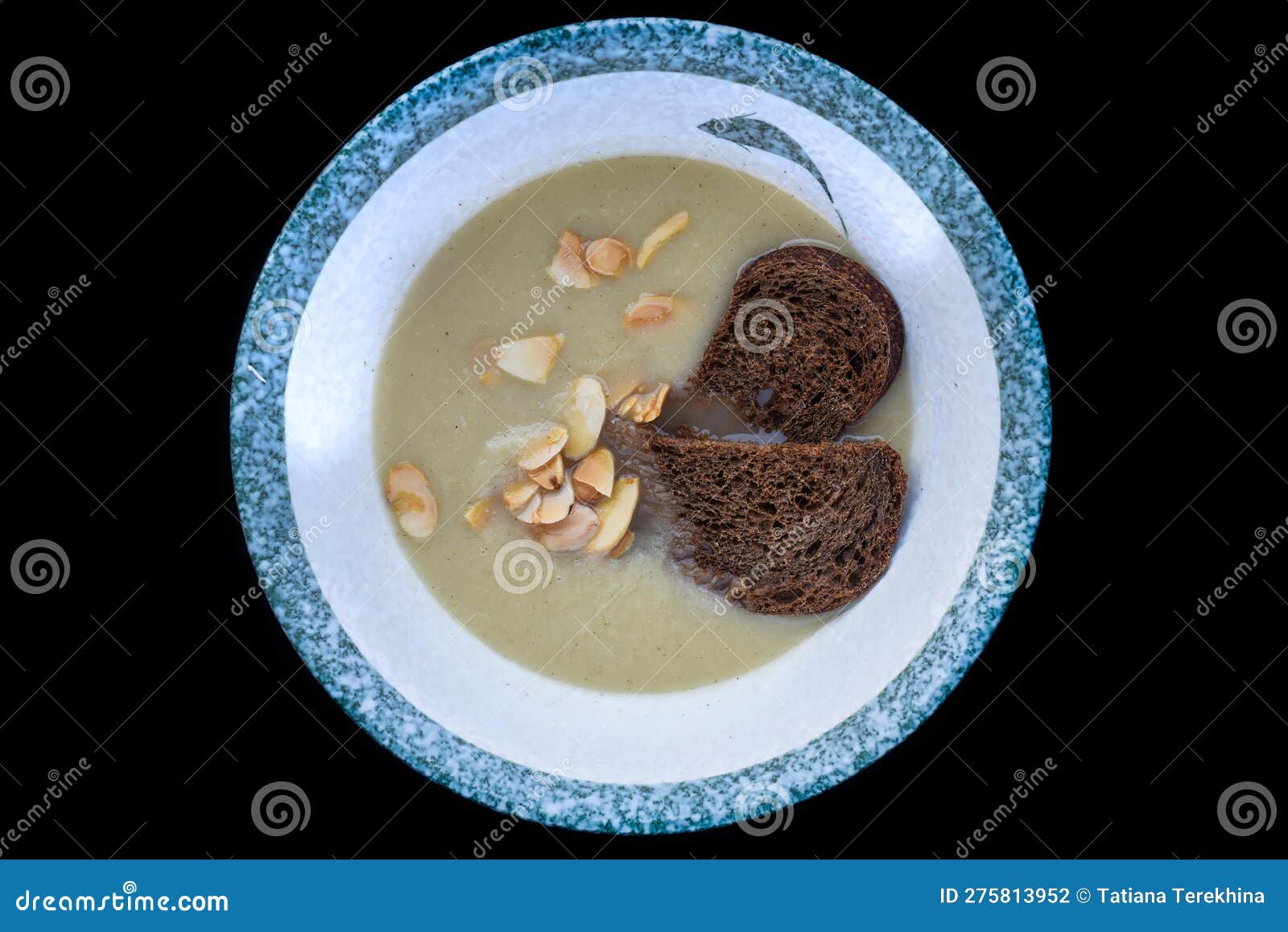 Vegetarian Chestnut Soup with Black Bread Isolated for a Menu Stock