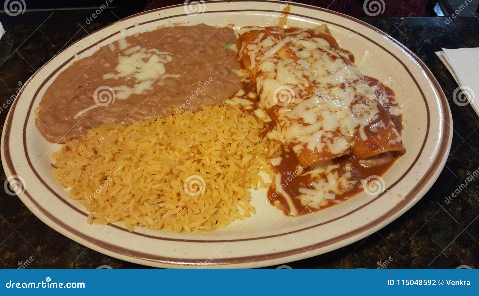 Vegetarian Mexican Food with Rice and Enchilada Stock Photo - Image of