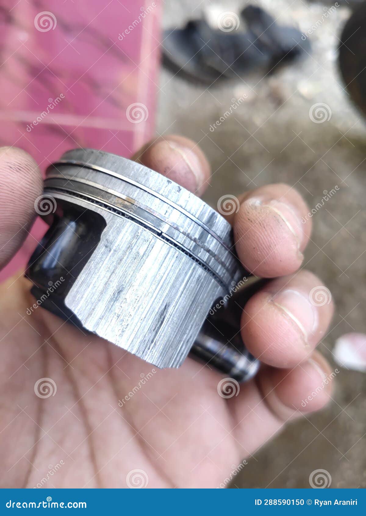 A Vehicle Piston that is Damaged Due To Frequent Use Stock Photo