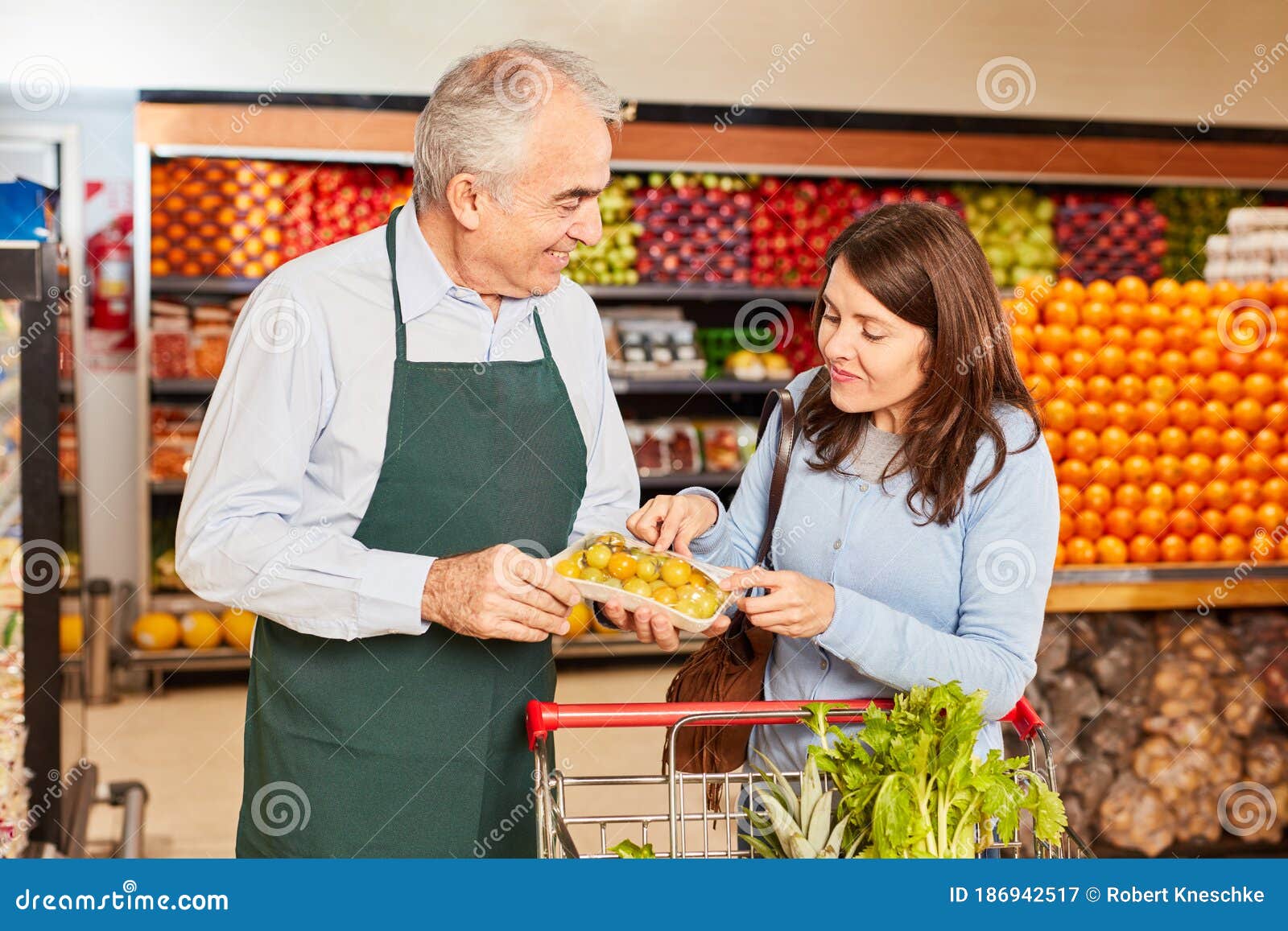 Vendedor Y Cliente En Una Degustación Imagen de archivo Imagen de