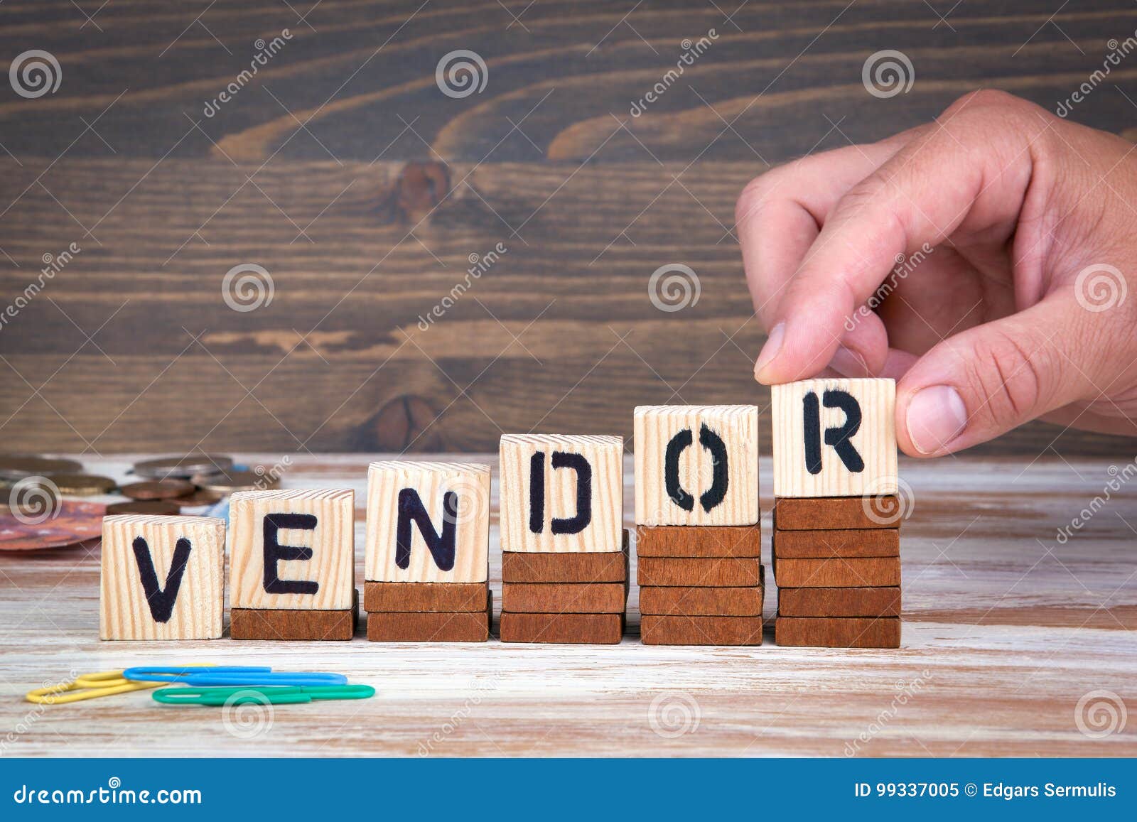 vendor concept. wooden letters on the office desk, informative and communication background