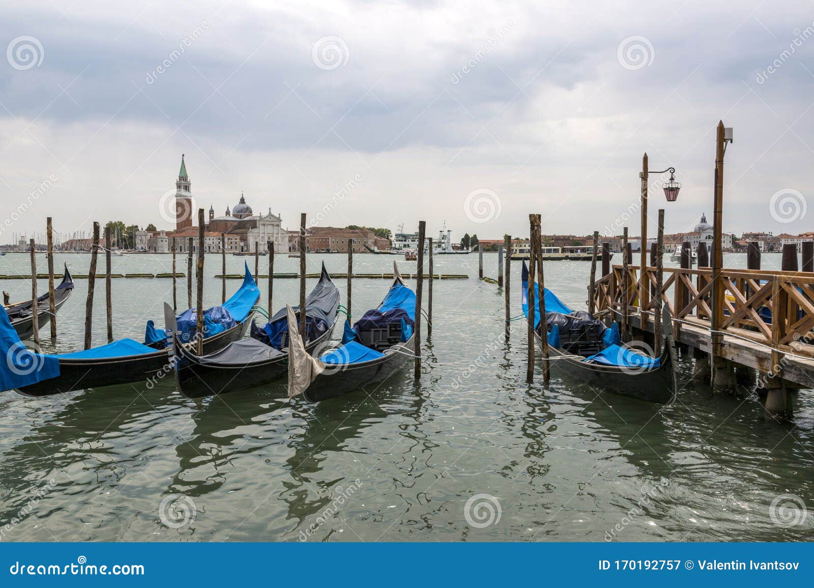 Jetty with Gondolas on the Venice Promenade Editorial Photography