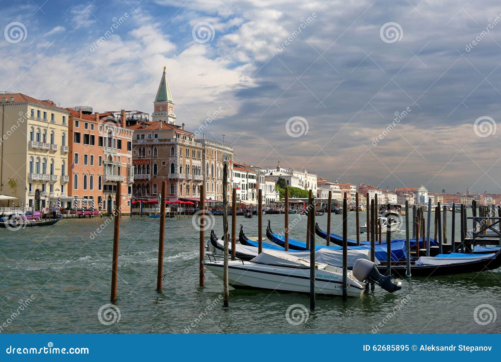 Venice, Italy. Parked Motor Boat And Gondolas In A Row ...