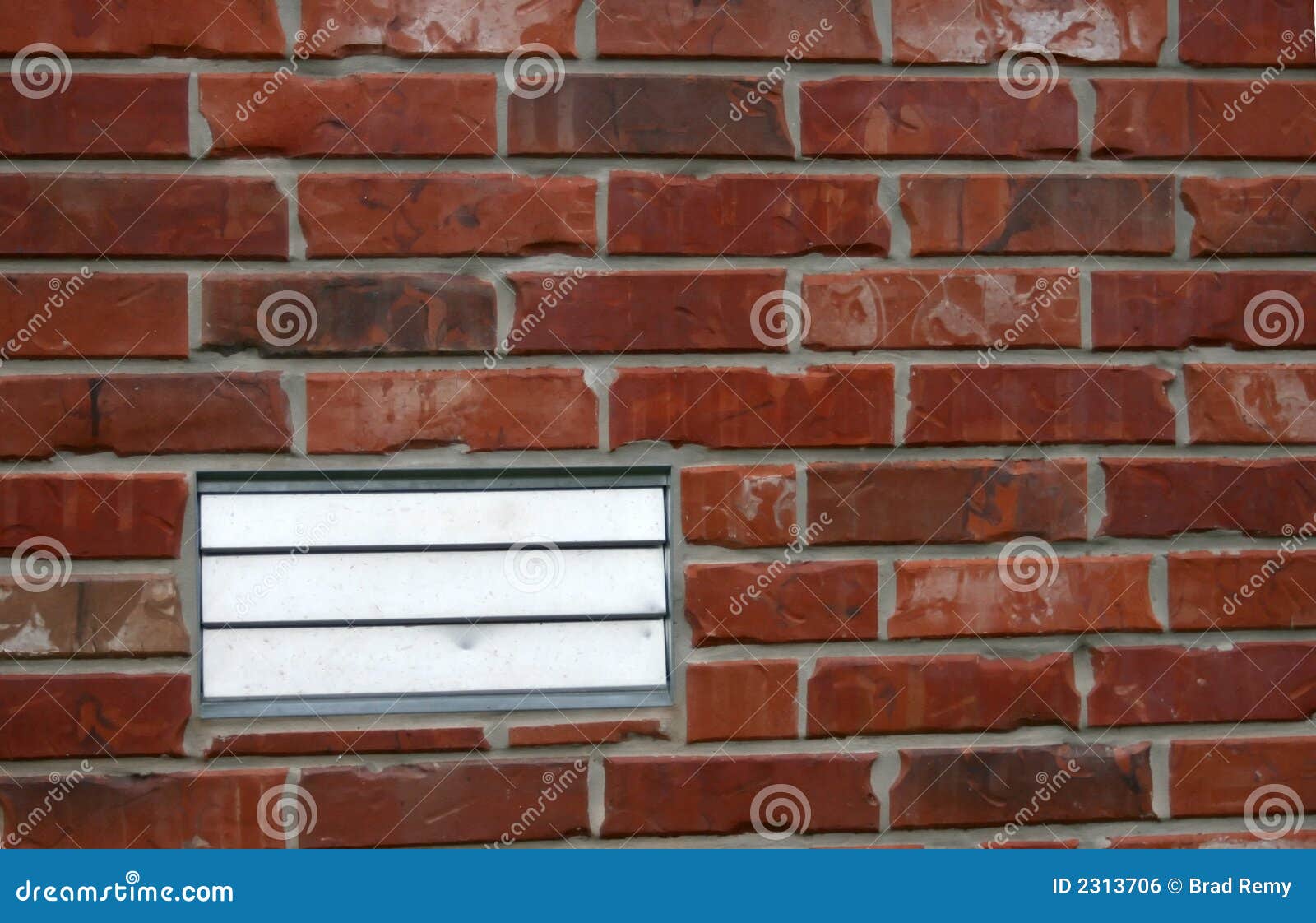 vent on brick house