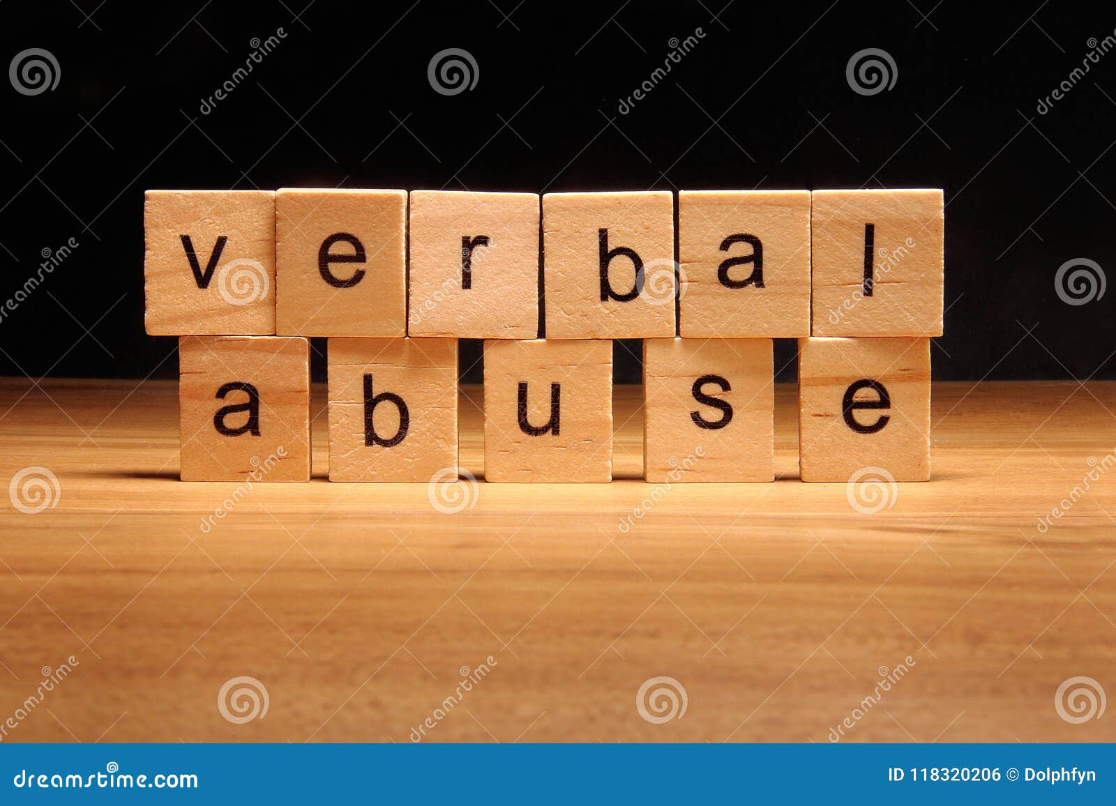 verbal abuse words written on wood cube