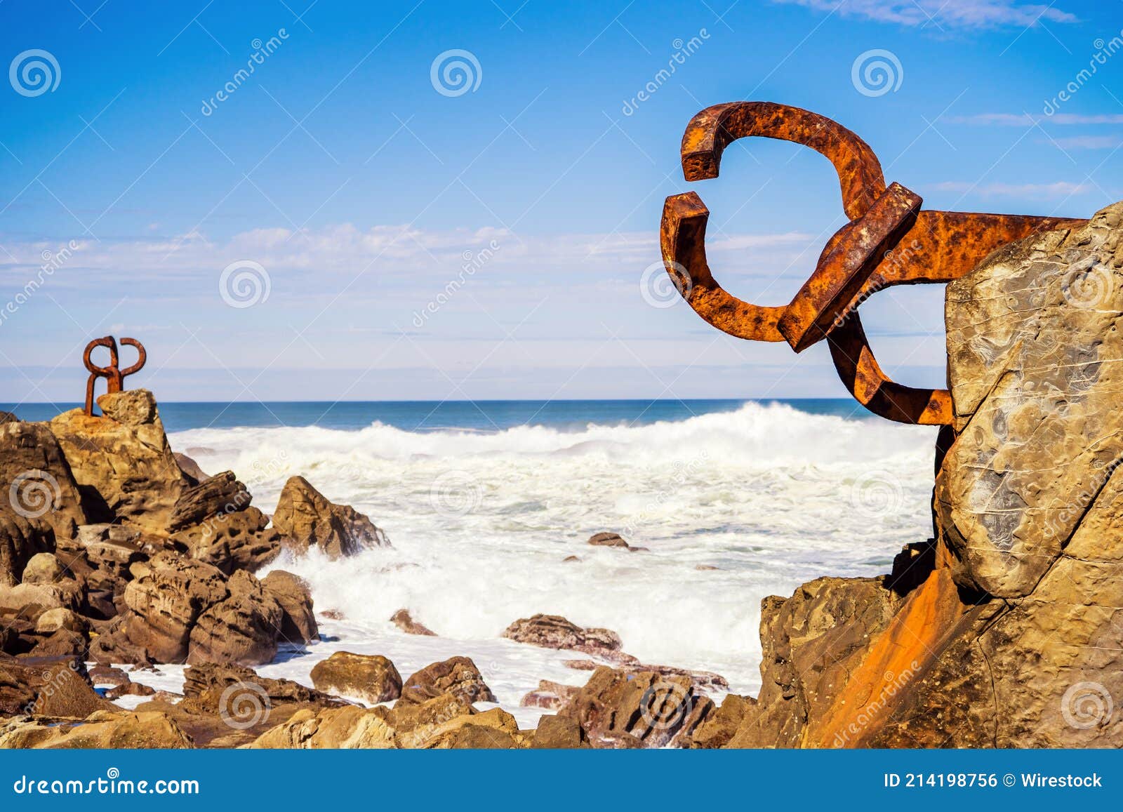 vertic shot of the peine del viento sculptures of eduardo chillida at the beach in spain