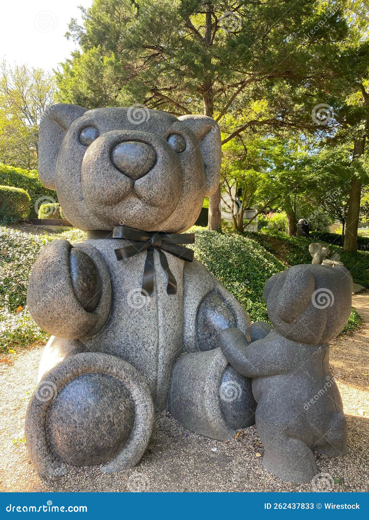 Vertical of Big and Small Teddy Bear Statues in Lakeside Park in Texas
