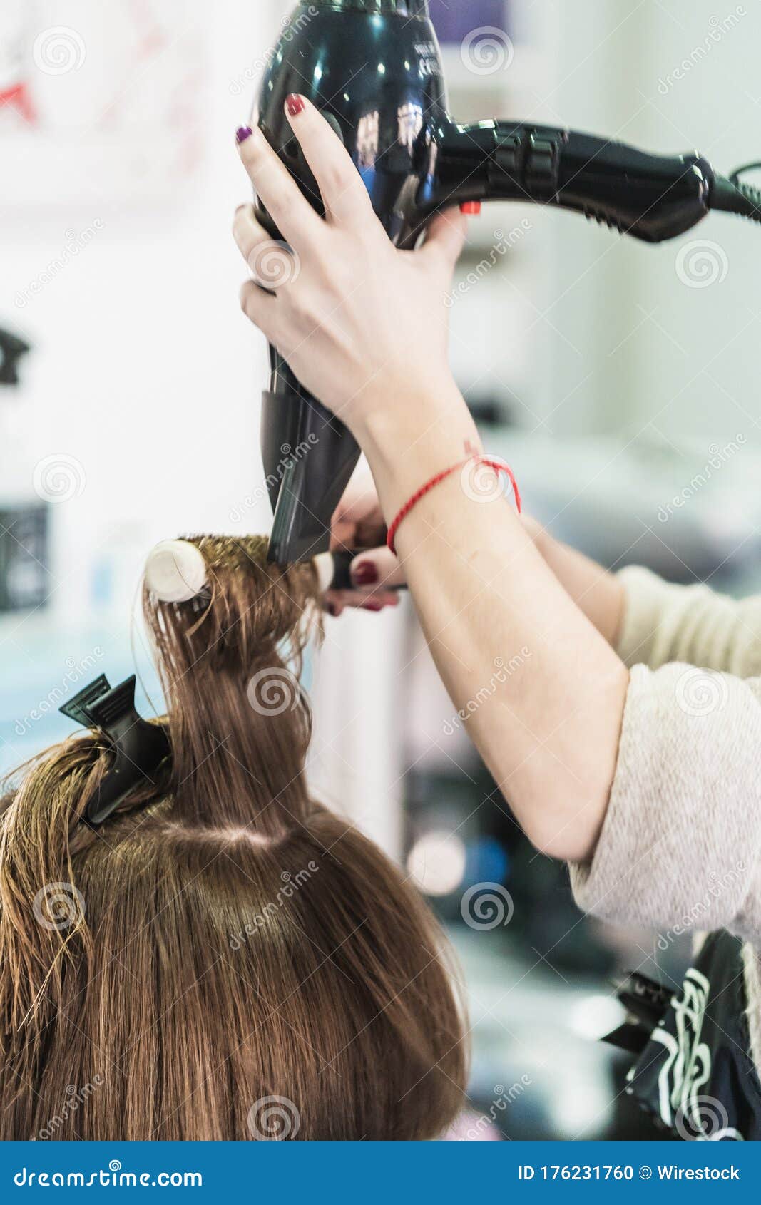 Vertical Closeup Shot of a Hairdresser Blow Drying a Woman S Short Hair in  a Beauty Salon Stock Photo - Image of model, hair: 176231760