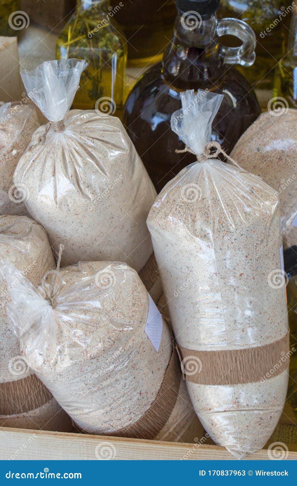 Vertical Closeup Shot of Plastic Bags Filled with Flour Stock Image