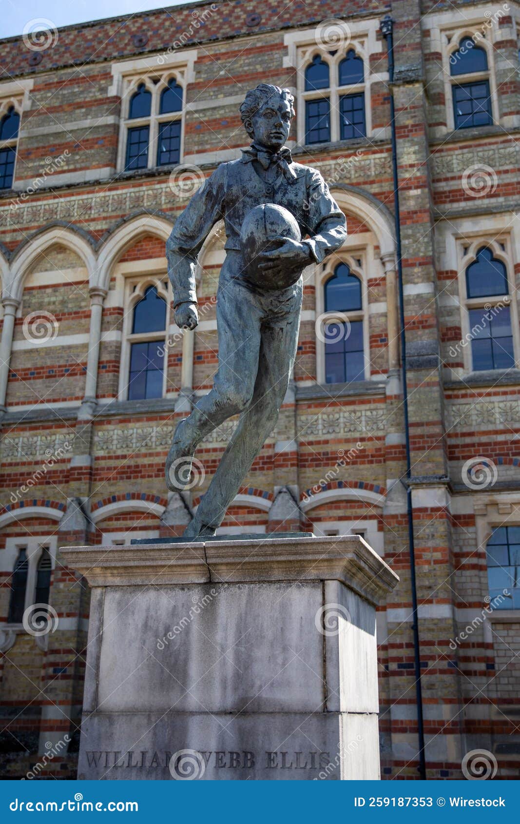 Vertical Closeup Shot of the Sculpture of William b Ellis in Front