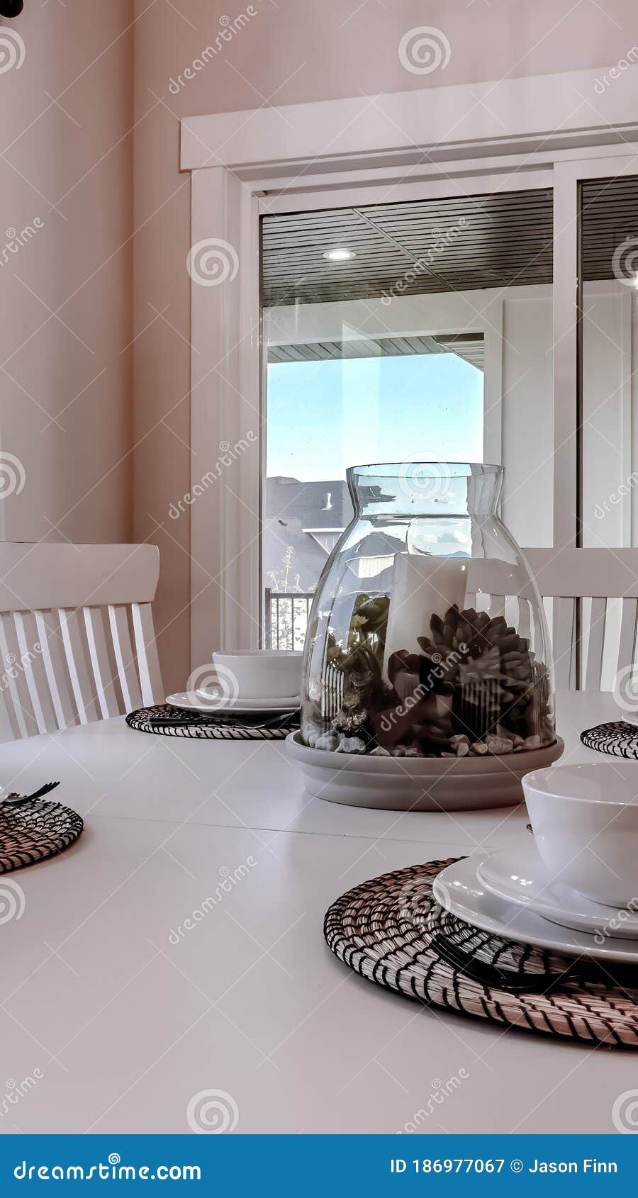 Vertical Dining Table With Chairs And Tableware Arranged Around A Decorative Centerpiece Stock Image Image Of Snow Knife 186977067