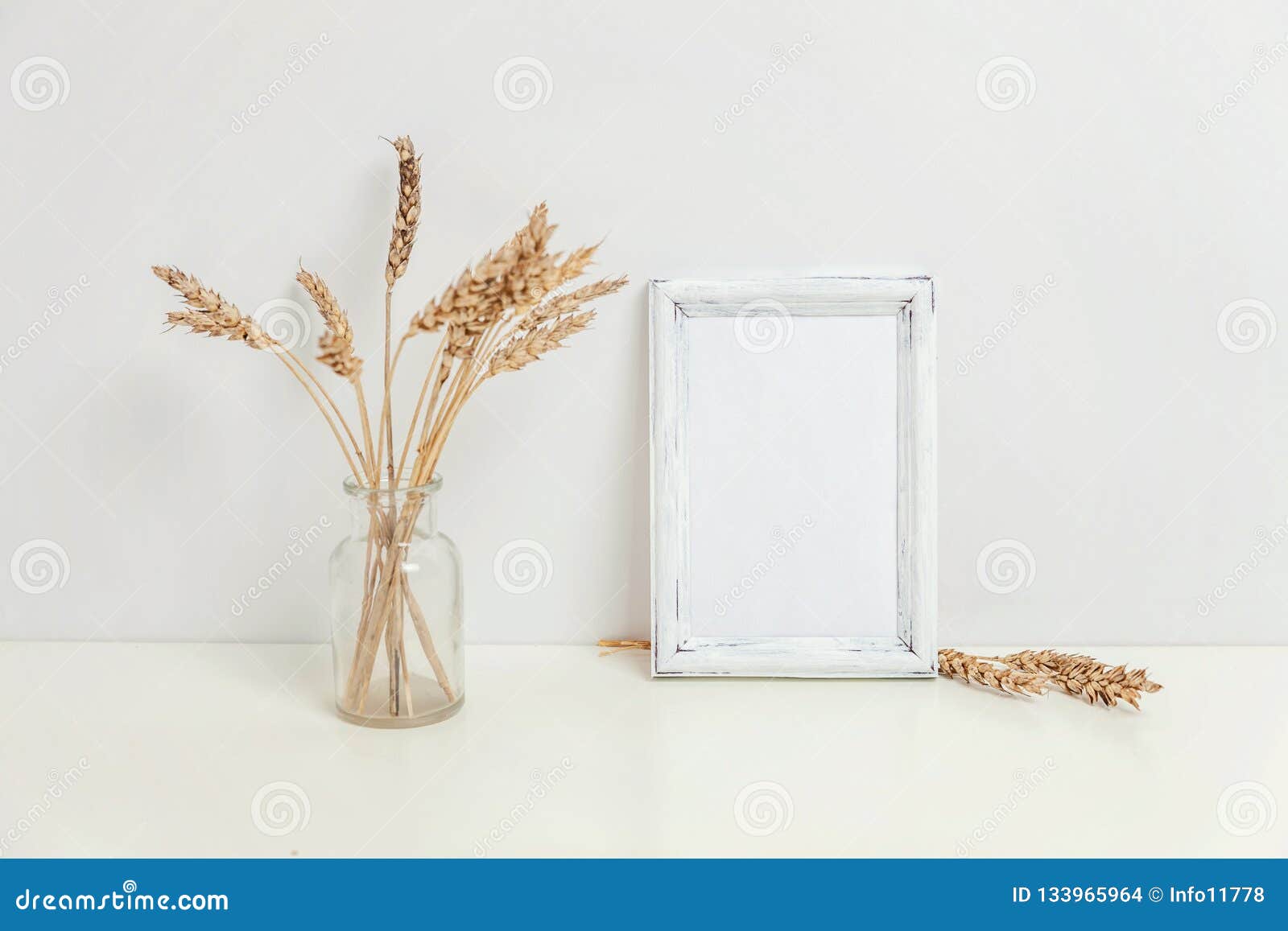 Download Vertical Frame Mockup With Wild Rye Bouquet In Glass Vase ...