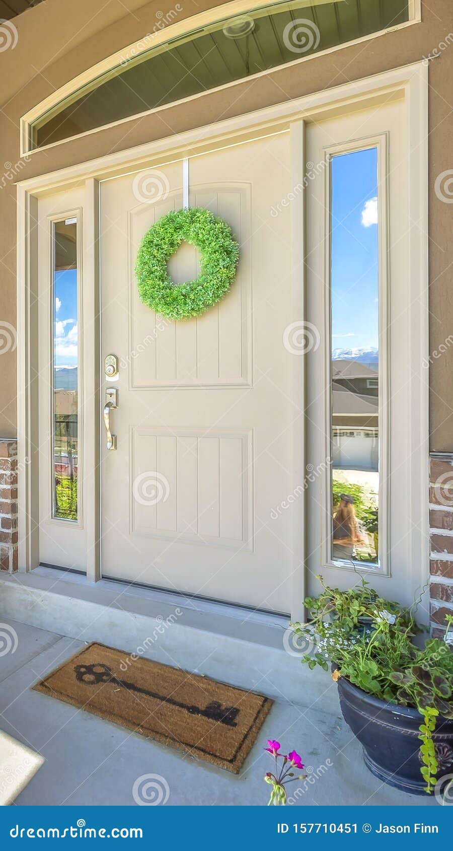 Vertical Front Door with Wreath Transom Window and Sideligts at the Facade  of a Home Stock Image - Image of brick, real: 157710451