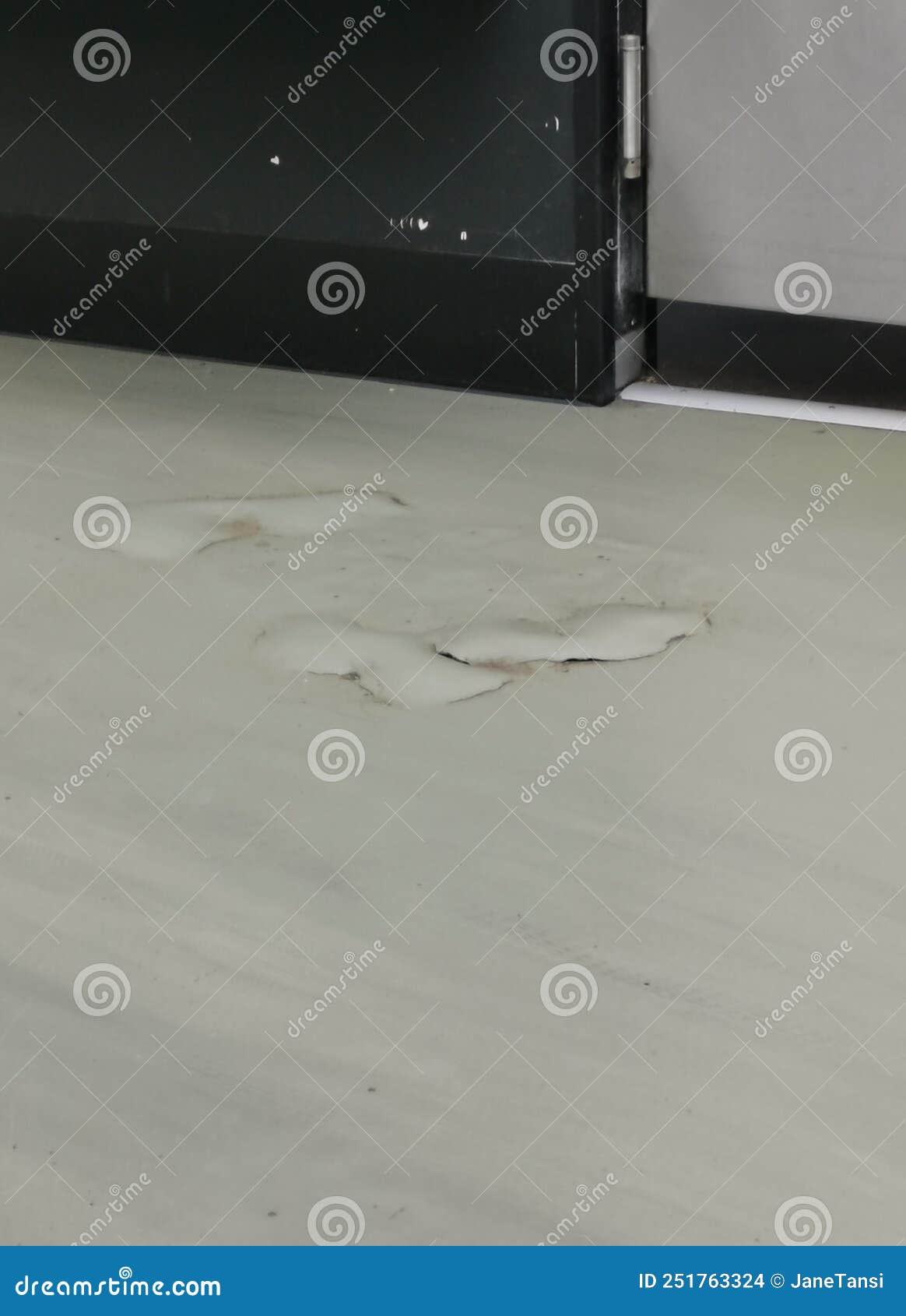 Vertical Image of Grubby Dirty Grey Floor with Raised Staining Stock
