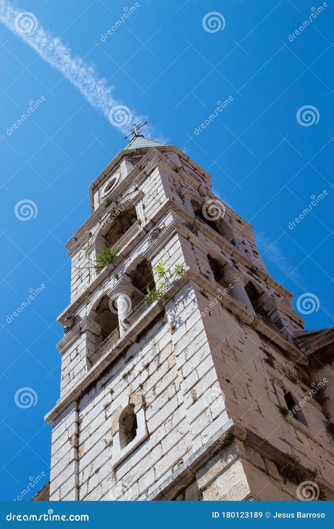 vertical picture of the bell tower of st. elias` church or church of st. elias in the old town of zadar, croatia, with a vapur