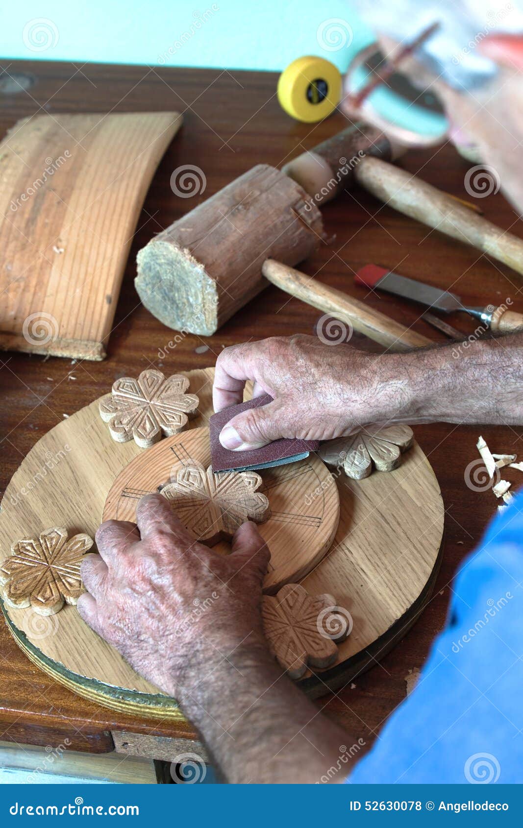 Vertical Portrait Hands Using Sandpaper on a Piece of Wood Stock Photo Image of