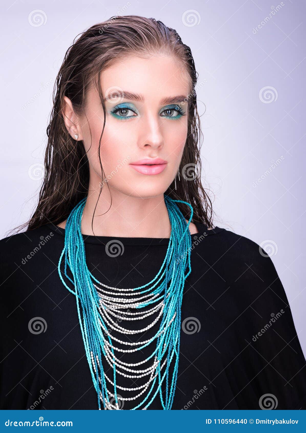 Vertical Portrait Of A Young Woman In Black. Wet Hair And ...