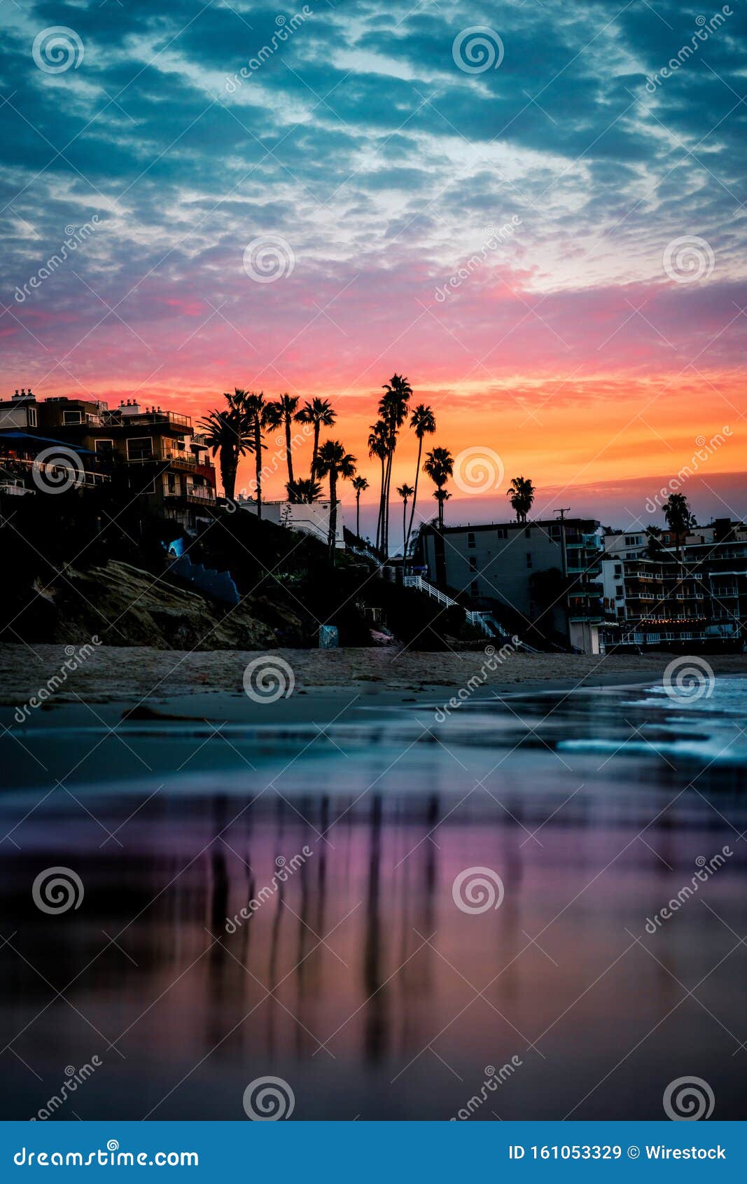 Vertical Shot Of A Beach Near A City During Sunset With Pink Clouds In The Sky Stock Image Image Of Design Banner 161053329