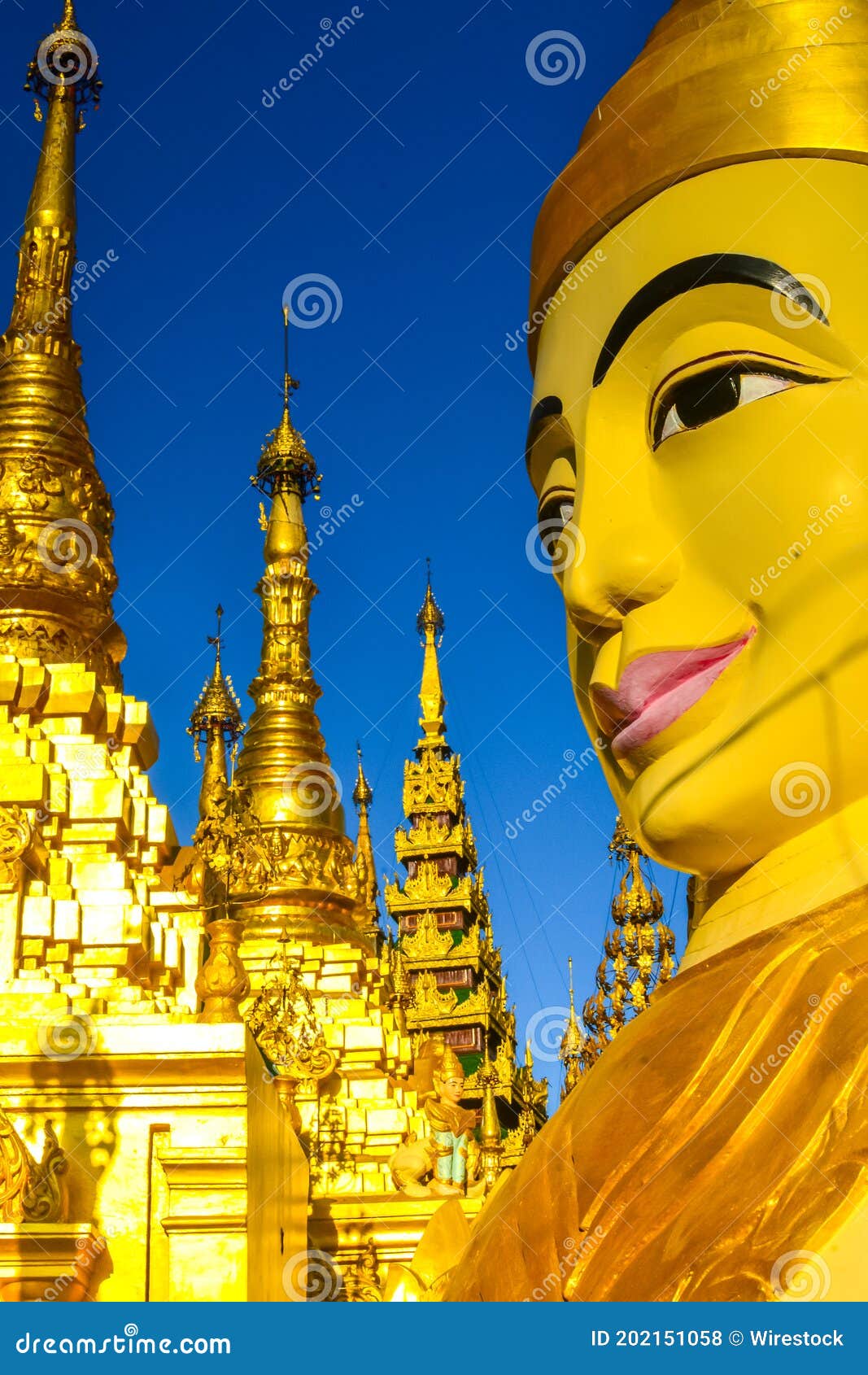 vertical shot of the big statue of gautama buddha in ngar htat gyi pagoda, yangon, myanmar