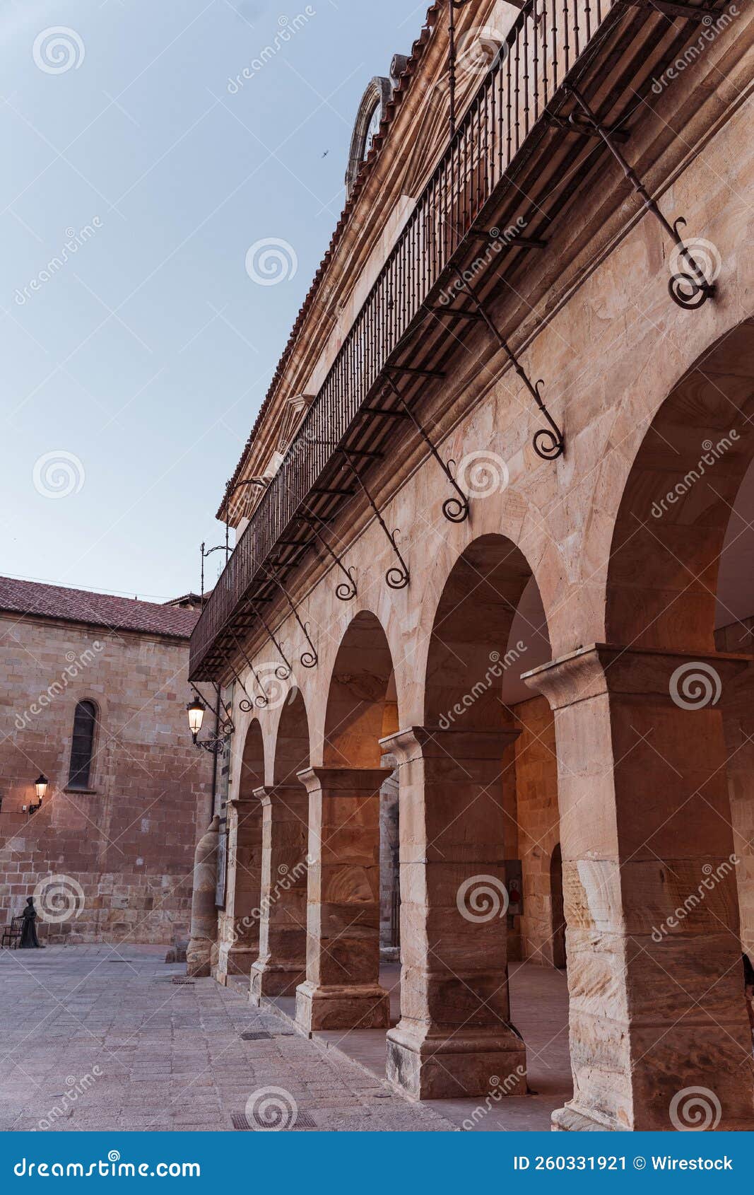 vertical shot of centro cultural palacio de la audiencia building with arches, soria, spain
