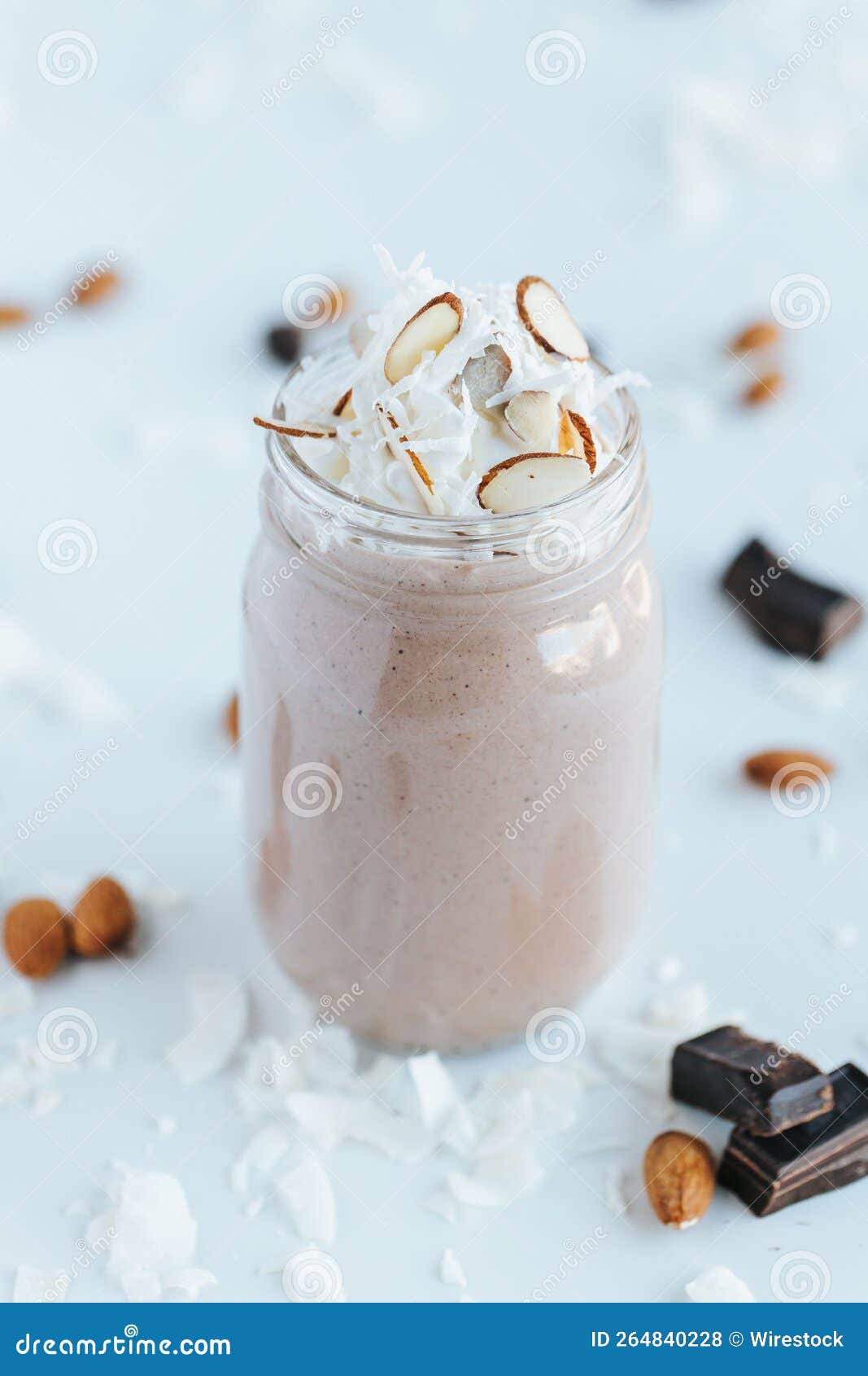 Vertical Shot of a Chocolate Protein Shake on the White Background