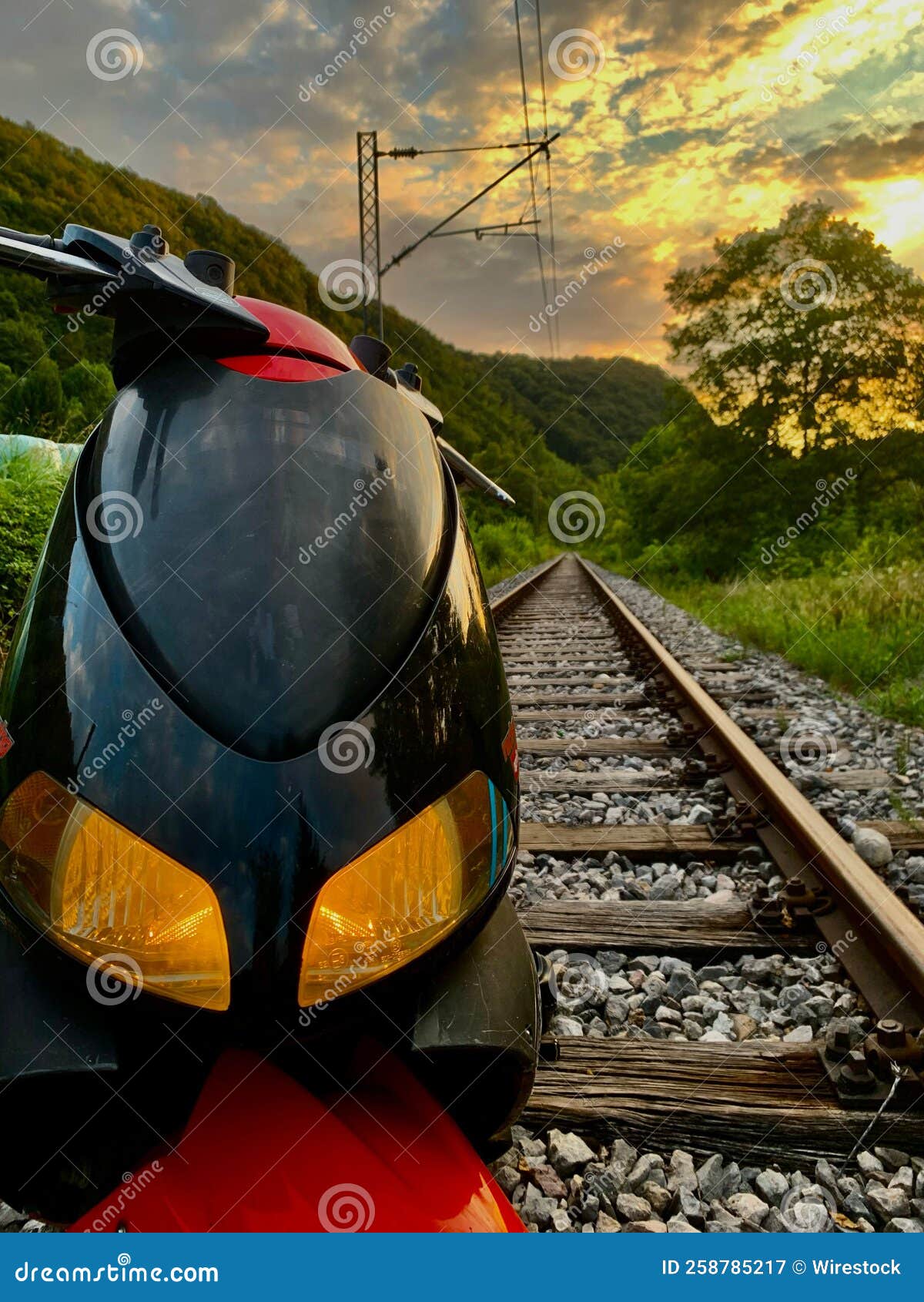 Vertical Shot of the Front of the Motorcycle on the Railway Trails at