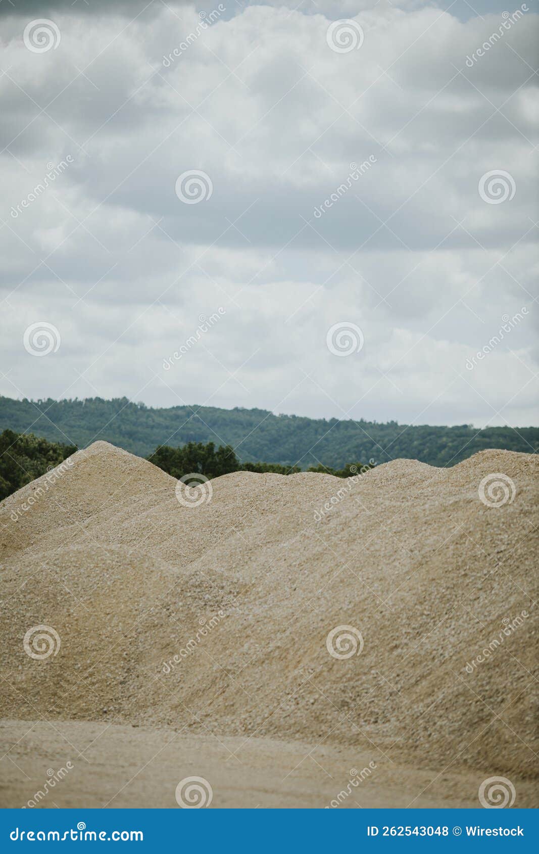 Vertical Shot of a Gravel Mountain at a Rural Construction Site Stock