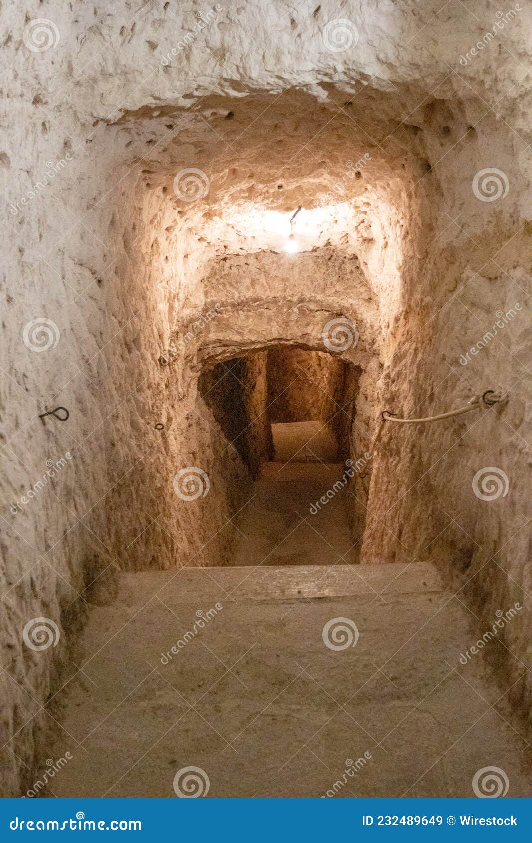 vertical shot of a man-made cave in alcana del jucar, castilia la mancha, spain