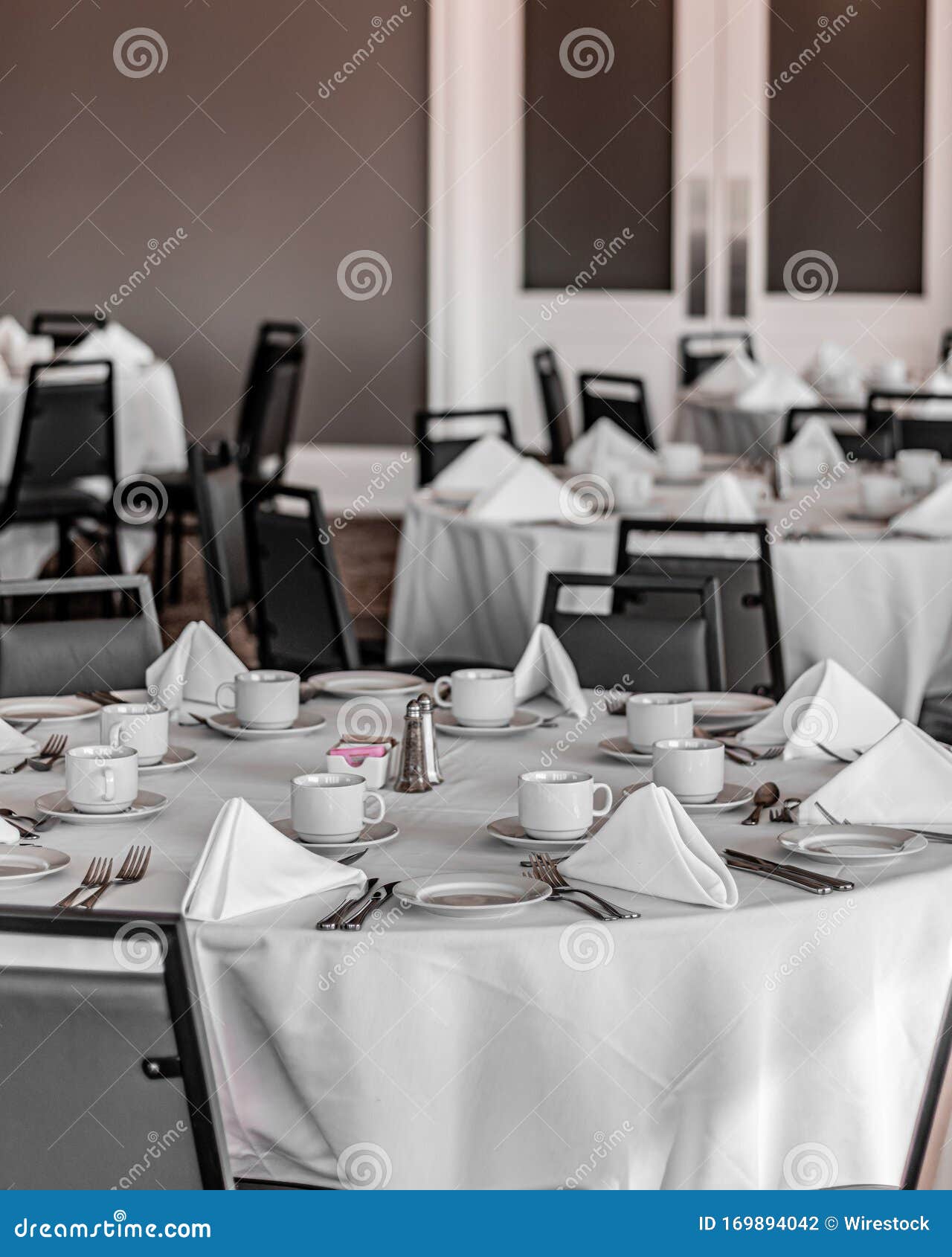 Vertical Shot of Neat Tables in a Nice, Empty and Clean Restaurant