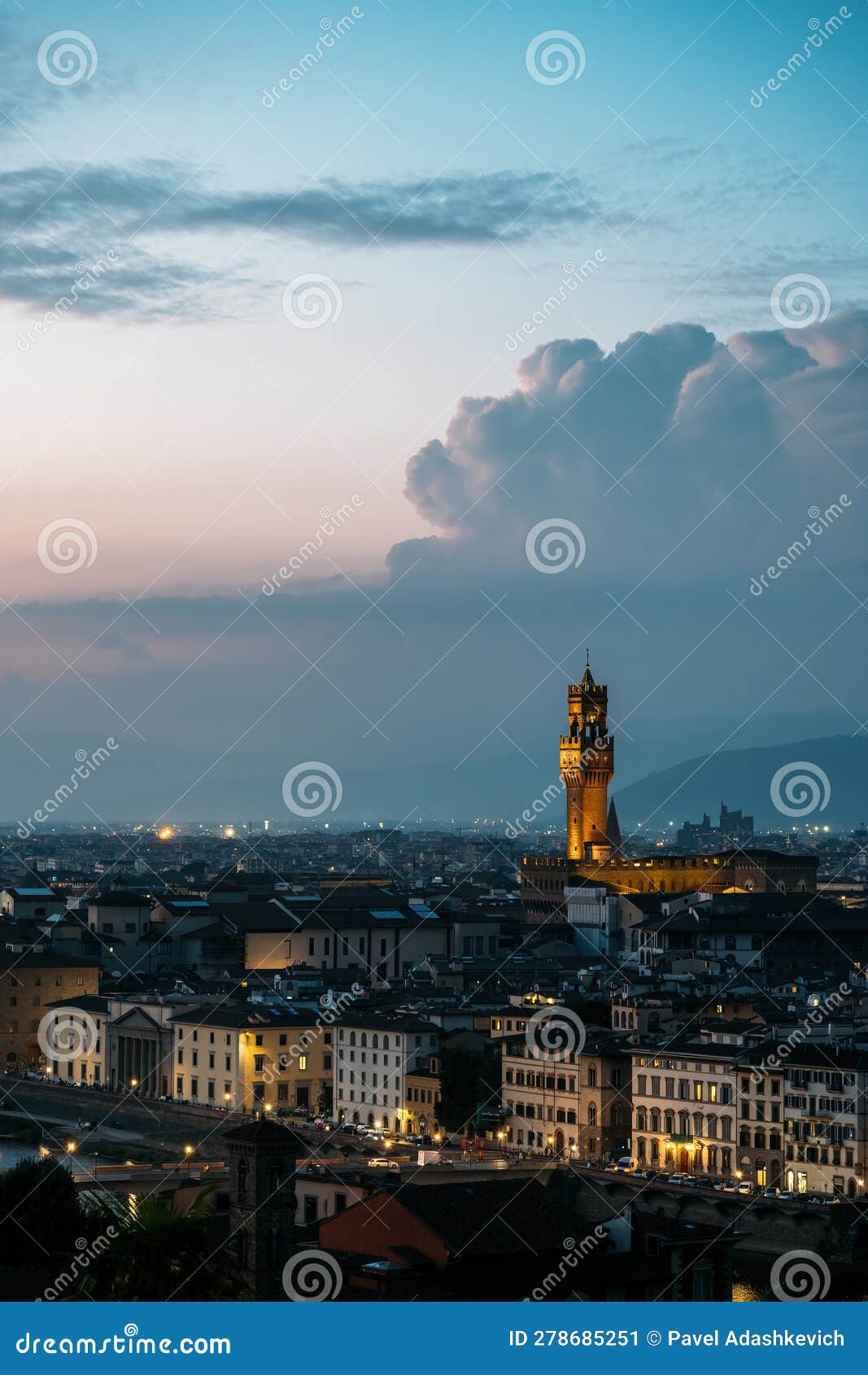 vertical shot of old palace in florence city hall tower architect arnolfo di cambio in evening lights on warm summer