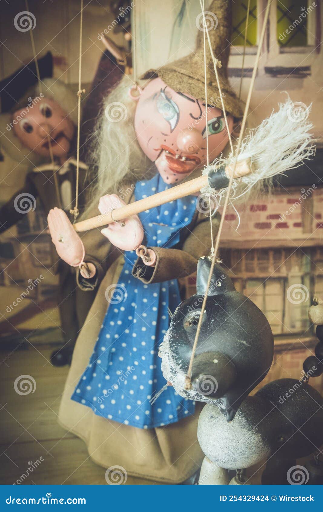 Vertical Shot of Puppets in an Amusement Arcade Machine Editorial Stock