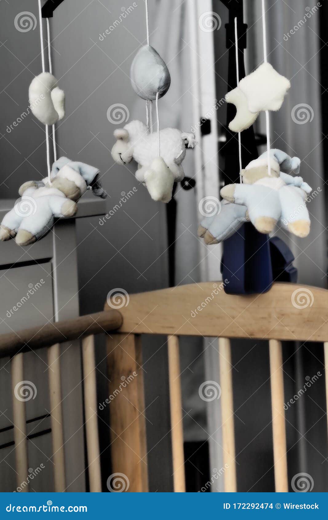 Vertical Shot of Several White Cows Hanging Over a Wooden Cradle Stock
