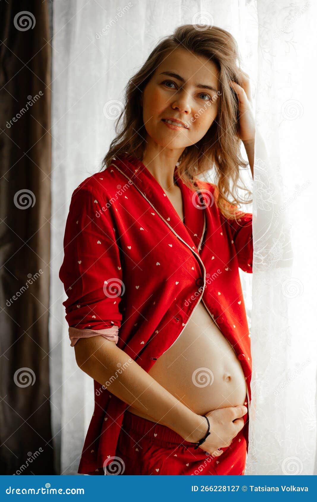 Vertical Smiling, Pensive Pregnant Blond Woman Holding Naked Belly, Wear  Red Pajamas, Resting and Relaxing. New Member Stock Image - Image of  mother, healthy: 266228127
